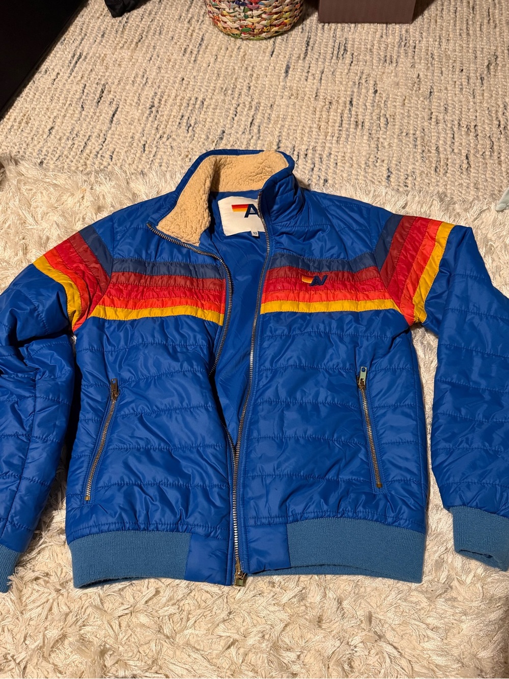 Aviator Nation Blue Quilted Puffer Jacket with Red and Yellow Stripes